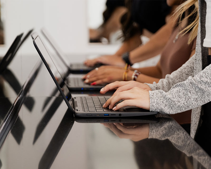 students on laptops